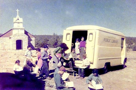 A bookmobile of Albuquerque Public LIbrary stops in Tijeras village, 1955